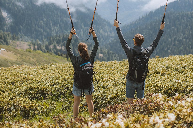 A Couple Is Hiking