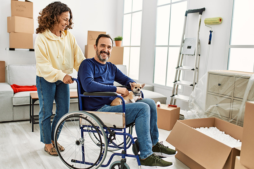 A Man In A Wheelchair Is Relocating