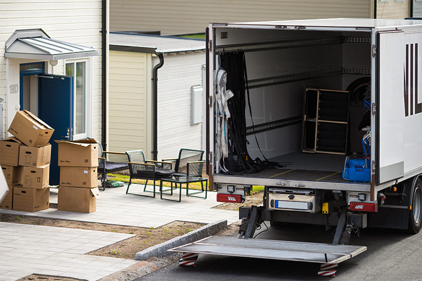 A Moving Truck Parked For Loading