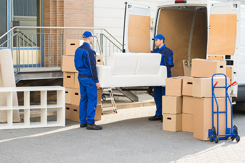 Movers Load Stuff Into a Removal Truck