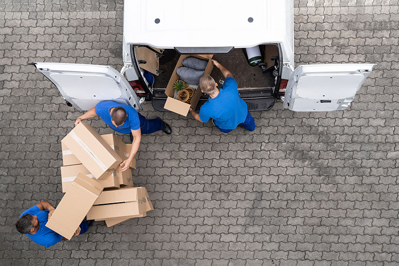 Movers nloading a truck