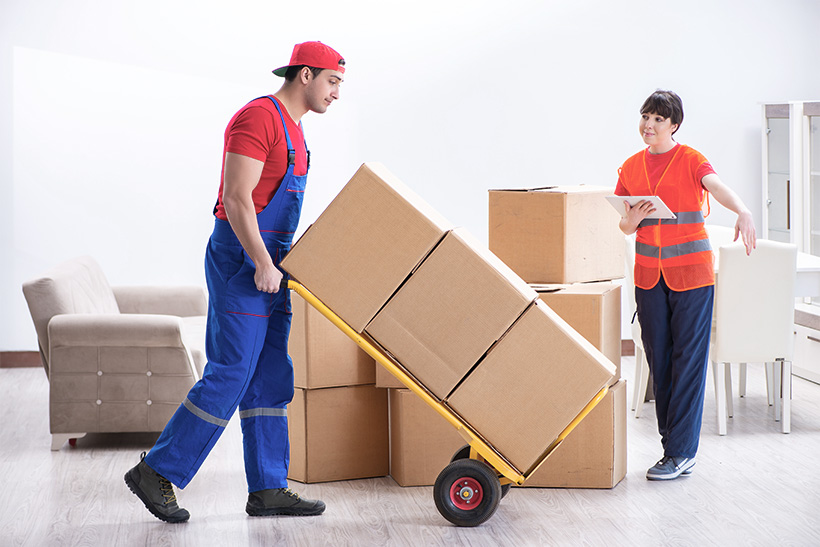 A Mover is Working with a Moving Dolly