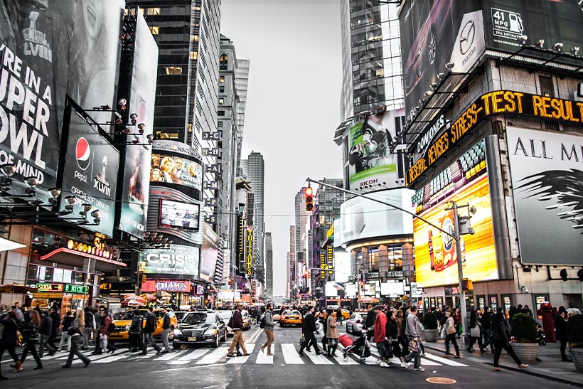 A street full of people in NYC