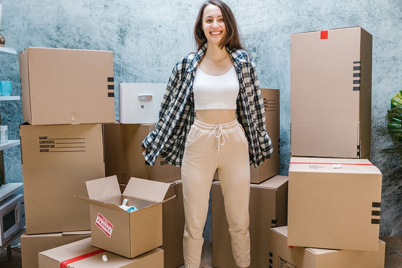 A Girl Is Packing For Moving