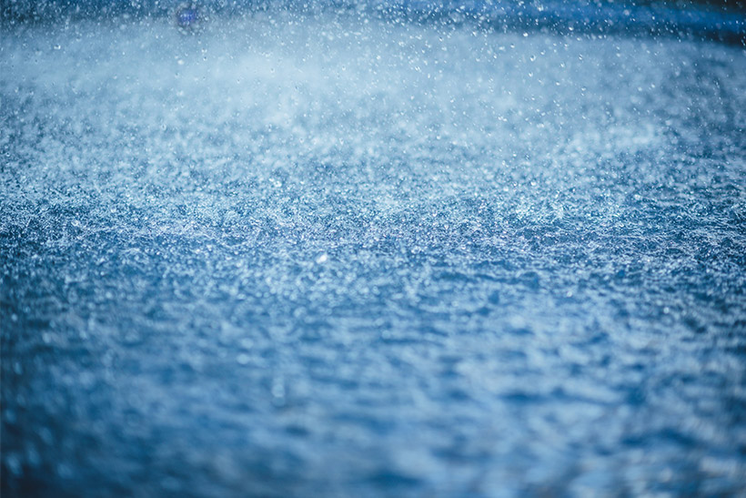 A Closeup Of A Street During Strong Rain